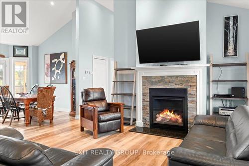 96 Huyck'S Bay Road, Prince Edward County (Wellington), ON - Indoor Photo Showing Living Room With Fireplace