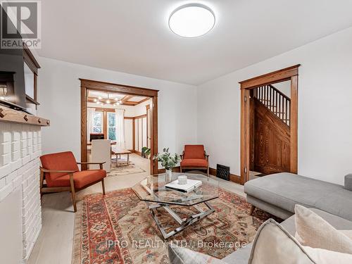 11 Phin Avenue, Toronto, ON - Indoor Photo Showing Living Room With Fireplace