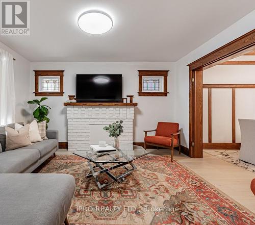 11 Phin Avenue, Toronto, ON - Indoor Photo Showing Living Room With Fireplace