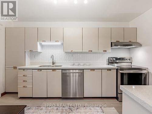 11 Phin Avenue, Toronto, ON - Indoor Photo Showing Kitchen With Stainless Steel Kitchen With Double Sink