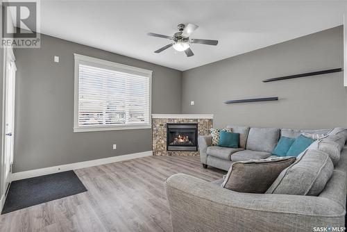 430 Langer Place, Warman, SK - Indoor Photo Showing Living Room With Fireplace