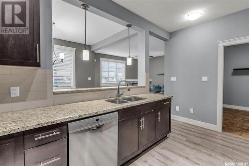 430 Langer Place, Warman, SK - Indoor Photo Showing Kitchen With Double Sink