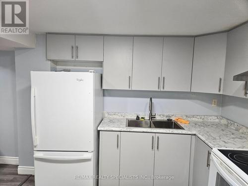 Lower - 72 Sweet Clover Crescent, Brampton, ON - Indoor Photo Showing Kitchen With Double Sink