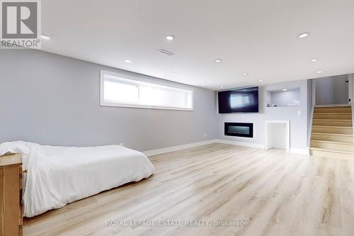 23 Crawford Drive, Ajax, ON - Indoor Photo Showing Bedroom With Fireplace