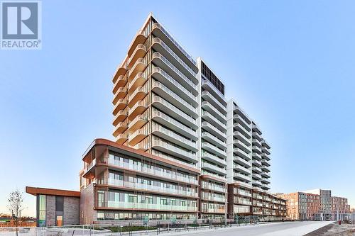 112 - 220 Missinnihe Way, Mississauga, ON - Outdoor With Facade