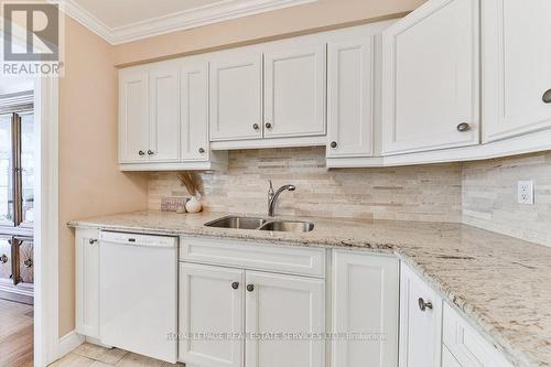 301 - 2175 Marine Drive, Oakville, ON - Indoor Photo Showing Kitchen With Double Sink