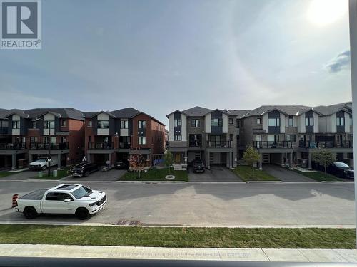 205 - 480 Gordon Krantz Avenue, Milton, ON - Outdoor With Balcony With Facade