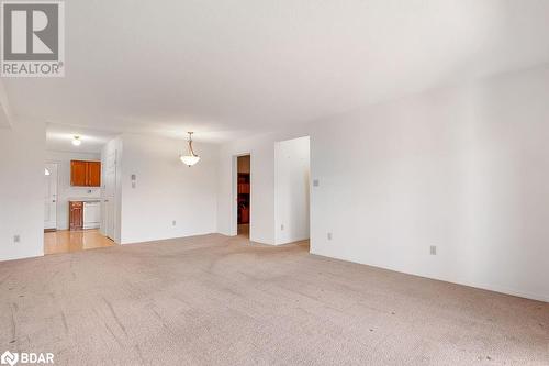 Spare room featuring light carpet - 73 Lywood Street Unit# 2, Belleville, ON - Indoor Photo Showing Other Room