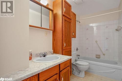 Full bathroom with vanity, toilet, and tiled shower / bath combo - 73 Lywood Street Unit# 2, Belleville, ON - Indoor Photo Showing Bathroom