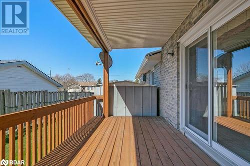 Wooden deck with a storage unit - 73 Lywood Street Unit# 2, Belleville, ON - Outdoor With Deck Patio Veranda With Exterior