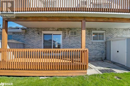 Wooden terrace featuring a shed - 73 Lywood Street Unit# 2, Belleville, ON - Outdoor With Exterior