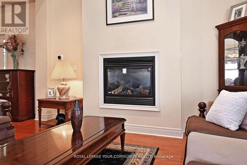 84 Long Stan, Whitchurch-Stouffville, ON - Indoor Photo Showing Living Room With Fireplace