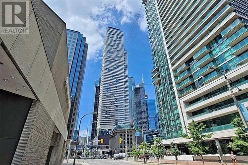 2407 - 100 Harbour Street, Toronto, ON - Outdoor With Facade