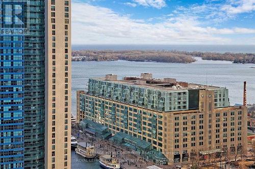 2407 - 100 Harbour Street, Toronto, ON - Outdoor With Body Of Water With Facade With View