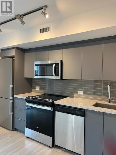 609 - 30 Tretti Way, Toronto, ON - Indoor Photo Showing Kitchen With Upgraded Kitchen