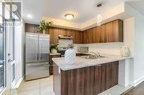 115 - 1 Dufay Road, Brampton, ON - Indoor Photo Showing Kitchen