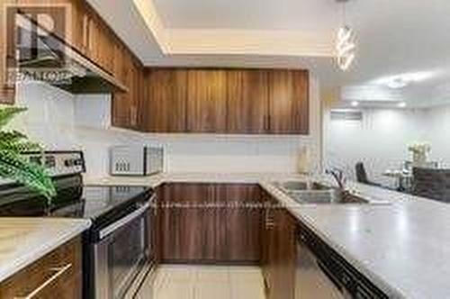 115 - 1 Dufay Road, Brampton, ON - Indoor Photo Showing Kitchen With Double Sink With Upgraded Kitchen