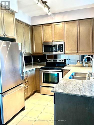 1117 - 10 Bloorview Place, Toronto, ON - Indoor Photo Showing Kitchen With Stainless Steel Kitchen With Double Sink