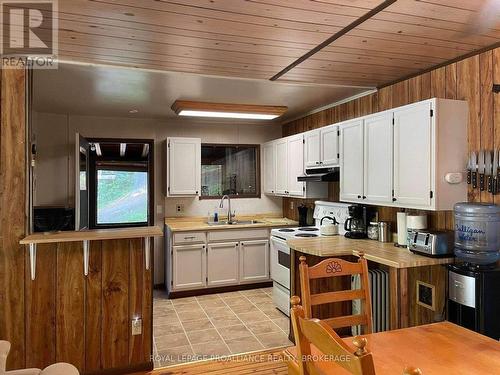 1300 Grants Creek Road, Tay Valley (904 - Bathurst/Burgess & Sherbrooke (North Burgess) Twp), ON - Indoor Photo Showing Kitchen With Double Sink