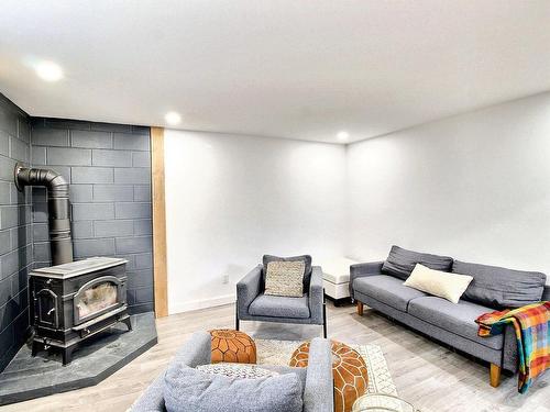 Salle de jeux - 1440 Rue Perreault E., Rouyn-Noranda, QC - Indoor With Fireplace