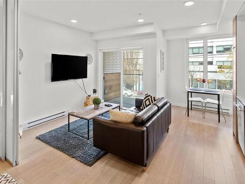 209-1033 Cook St, Victoria, BC - Indoor Photo Showing Living Room