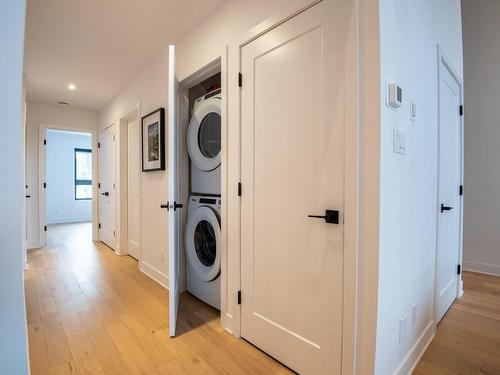 Passageway - 202-2000 Allée Du Val-De-Bagnes, Mont-Tremblant, QC - Indoor Photo Showing Laundry Room