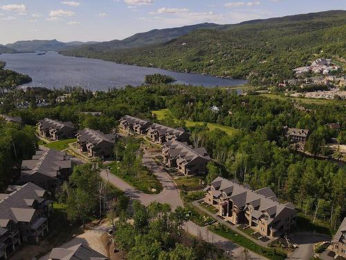 Aerial photo - 202-2000 Allée Du Val-De-Bagnes, Mont-Tremblant, QC - Outdoor With Body Of Water With View