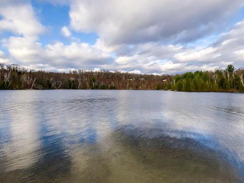 Bord de l'eau - 56 Ch. Du Canari, Val-Des-Monts, QC - Outdoor With Body Of Water With View