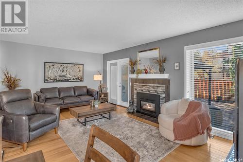 5028 Newport Road, Regina, SK - Indoor Photo Showing Living Room With Fireplace