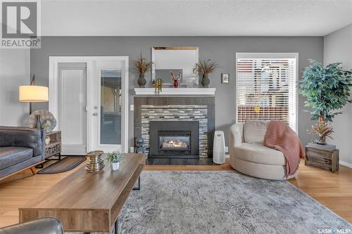 5028 Newport Road, Regina, SK - Indoor Photo Showing Living Room With Fireplace