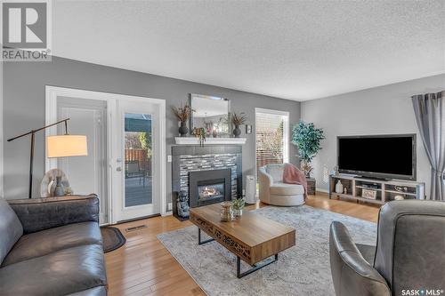 5028 Newport Road, Regina, SK - Indoor Photo Showing Living Room With Fireplace