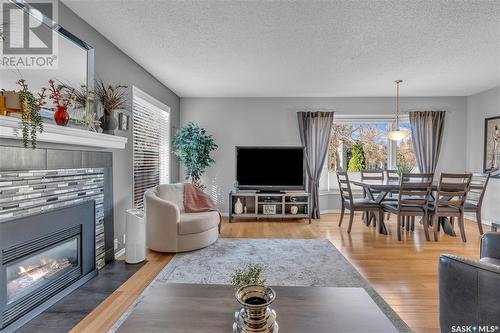 5028 Newport Road, Regina, SK - Indoor Photo Showing Living Room With Fireplace