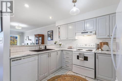 58 - 2737 King Street E, Hamilton, ON - Indoor Photo Showing Kitchen With Double Sink