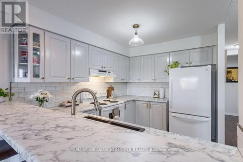 58 - 2737 King Street E, Hamilton, ON - Indoor Photo Showing Kitchen With Double Sink