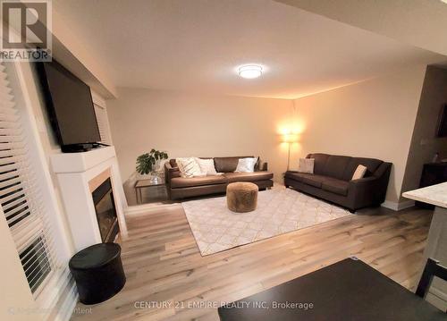 63 Jessop Drive, Brampton, ON - Indoor Photo Showing Living Room With Fireplace