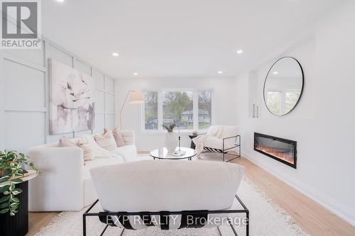 #Upper - 221 Federal Street, Hamilton, ON - Indoor Photo Showing Living Room With Fireplace