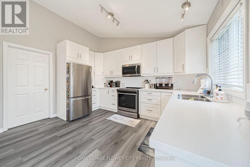 14 Stardust Drive N, Thames Centre, ON - Indoor Photo Showing Kitchen With Double Sink