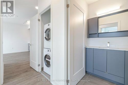 703 - 415 Main Street W, Hamilton, ON - Indoor Photo Showing Laundry Room