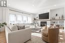 733 Sarazen Drive, Warman, SK  - Indoor Photo Showing Living Room With Fireplace 