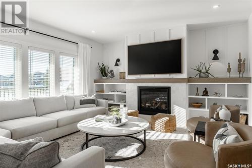 733 Sarazen Drive, Warman, SK - Indoor Photo Showing Living Room With Fireplace