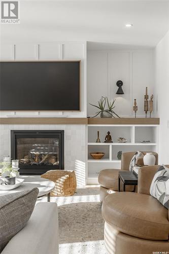 733 Sarazen Drive, Warman, SK - Indoor Photo Showing Living Room With Fireplace