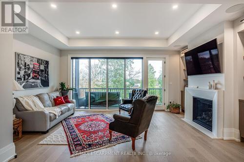 11 Church Street, Hamilton, ON - Indoor Photo Showing Living Room With Fireplace