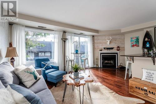 27 Turner Drive, Huntsville, ON - Indoor Photo Showing Living Room With Fireplace