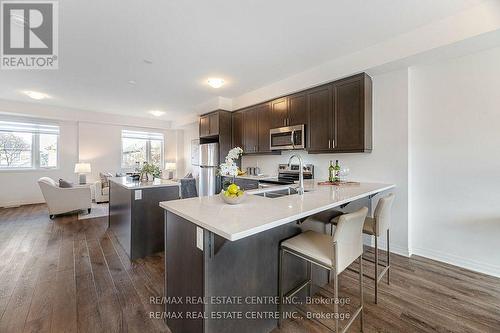 66 Kaitting Trail N, Oakville, ON - Indoor Photo Showing Kitchen With Double Sink