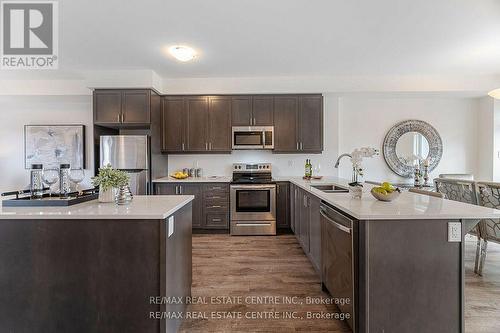 66 Kaitting Trail N, Oakville, ON - Indoor Photo Showing Kitchen With Double Sink With Upgraded Kitchen