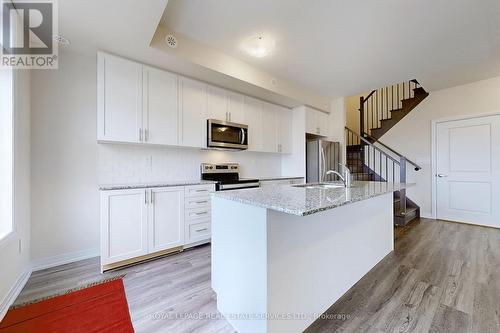 110 - 1573 Rose Way, Milton, ON - Indoor Photo Showing Kitchen With Upgraded Kitchen