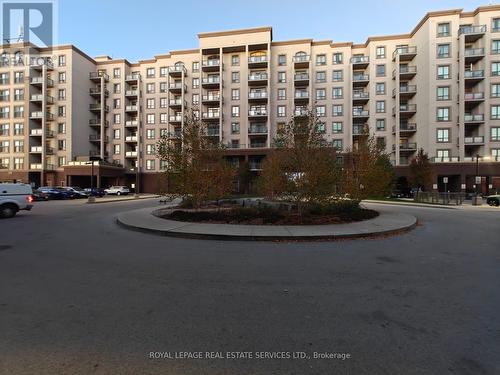 817 - 2490 Old Bronte Road, Oakville, ON - Outdoor With Balcony With Facade