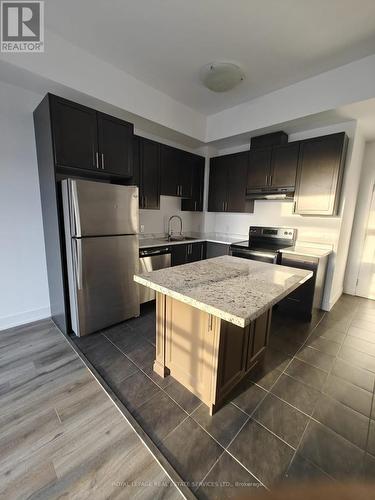 817 - 2490 Old Bronte Road, Oakville, ON - Indoor Photo Showing Kitchen With Stainless Steel Kitchen