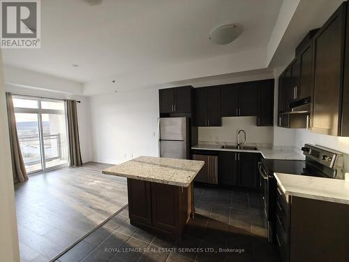 817 - 2490 Old Bronte Road, Oakville, ON - Indoor Photo Showing Kitchen With Double Sink