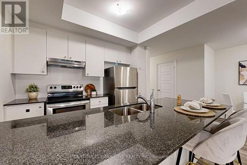 609 - 1034 Reflection Place, Pickering, ON - Indoor Photo Showing Kitchen With Stainless Steel Kitchen With Double Sink With Upgraded Kitchen